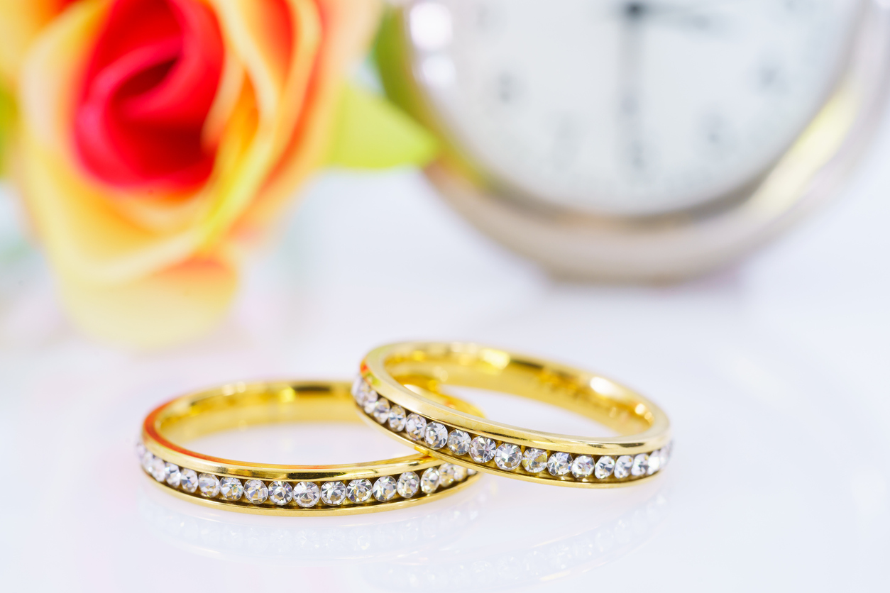 two gold and diamond rings